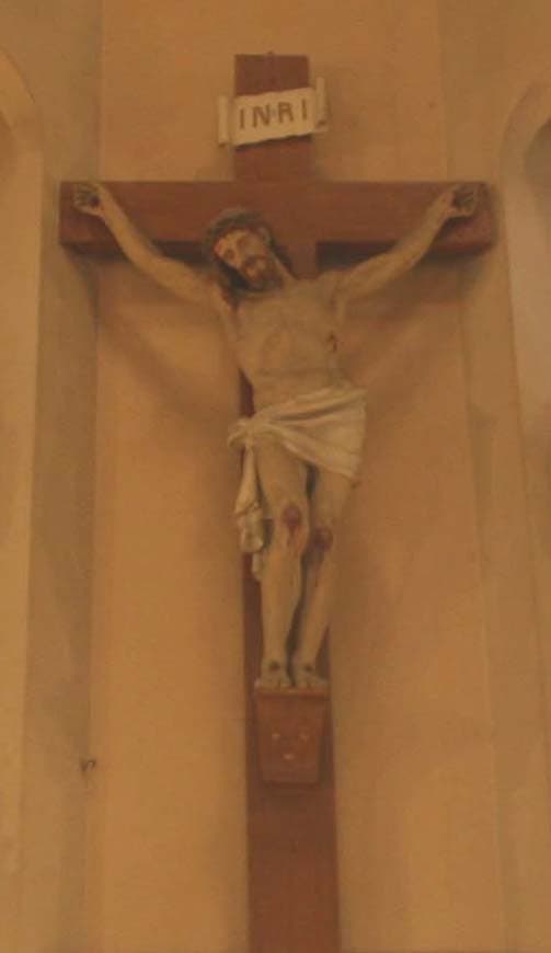 Crucifix en bois sculpté par Médard Bourgault